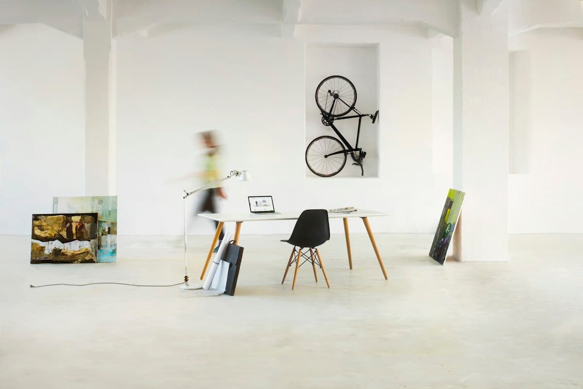 Bicycles displayed on a clean interior wall; illustrative editorial photography