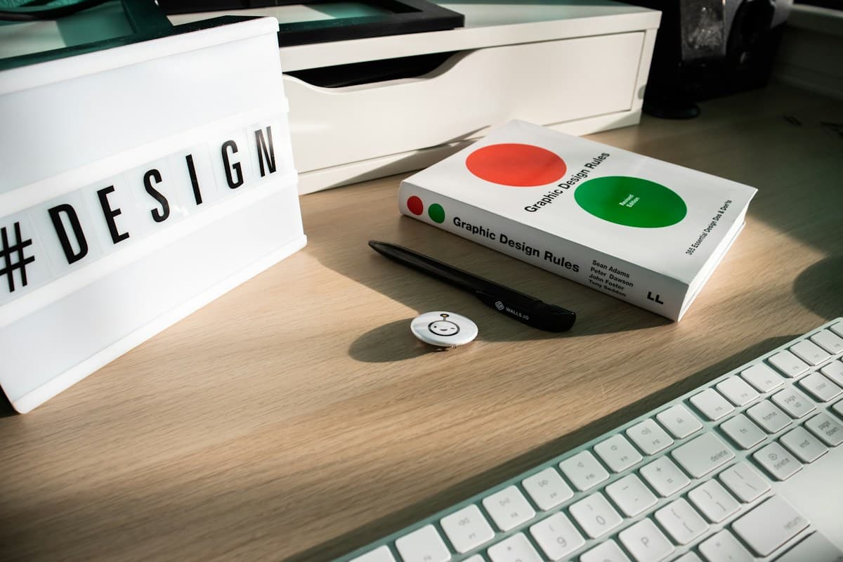A considered workspace with keyboard, notebook, and desk objects; illustrative editorial photography